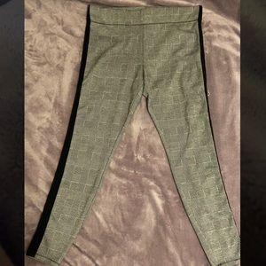 Plaid leggings with a black stripe down the side